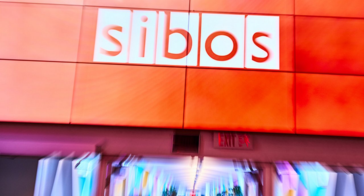 sibos sign on orange background