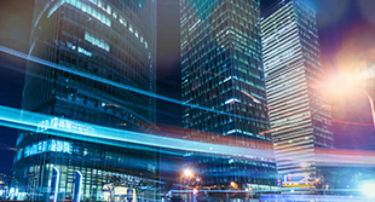 Abstract picture of skyscrapers with very swift traffic below