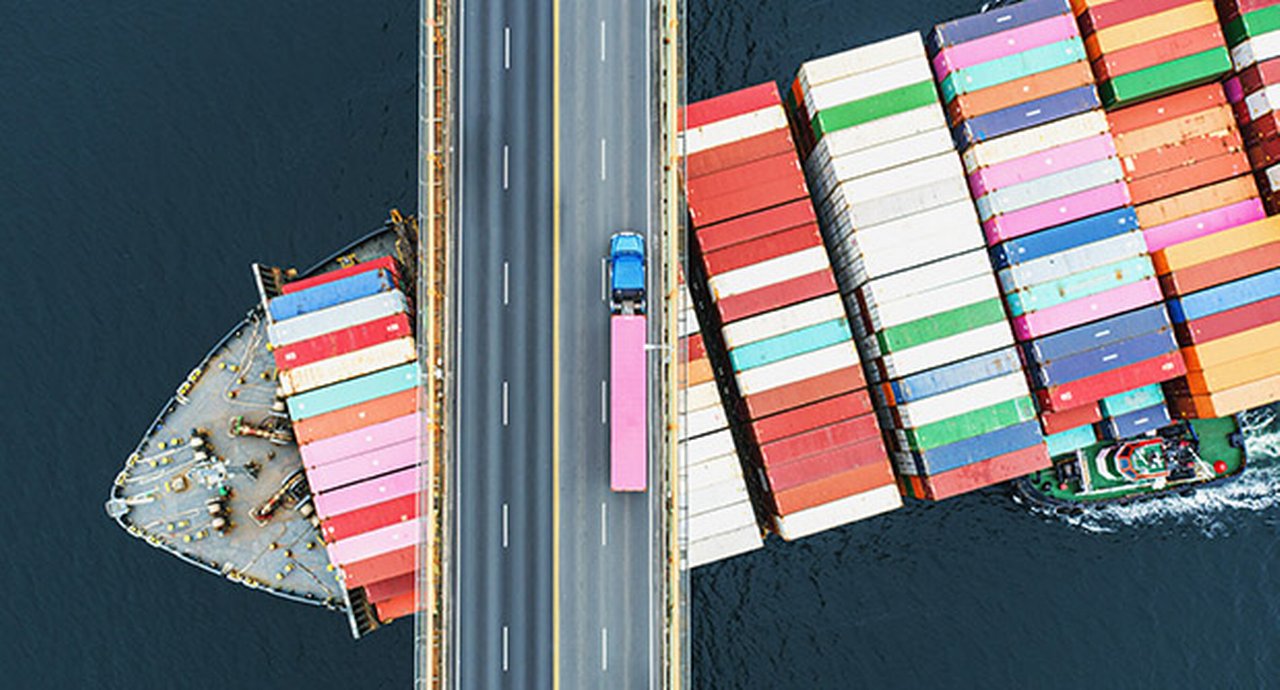 Container Ship Beneath Bridge