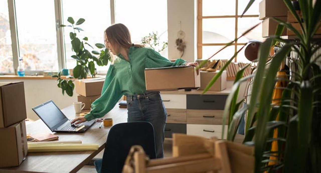 Young professional works hard to satisfy all her online shop customers