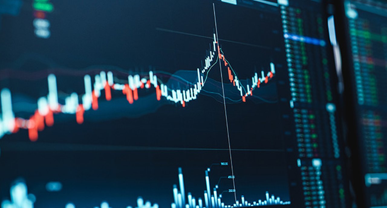 Close Up Shot Of A Computer Monitor Screen With Realtime Stocks Commodities And Exchange Market Charts