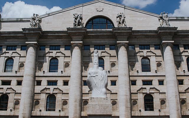 Statue at Piazza Affari, in front of the Milano Stock Exchange