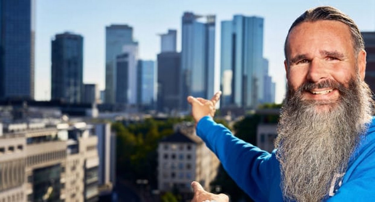 Jürgen Schmitt with a city in the background