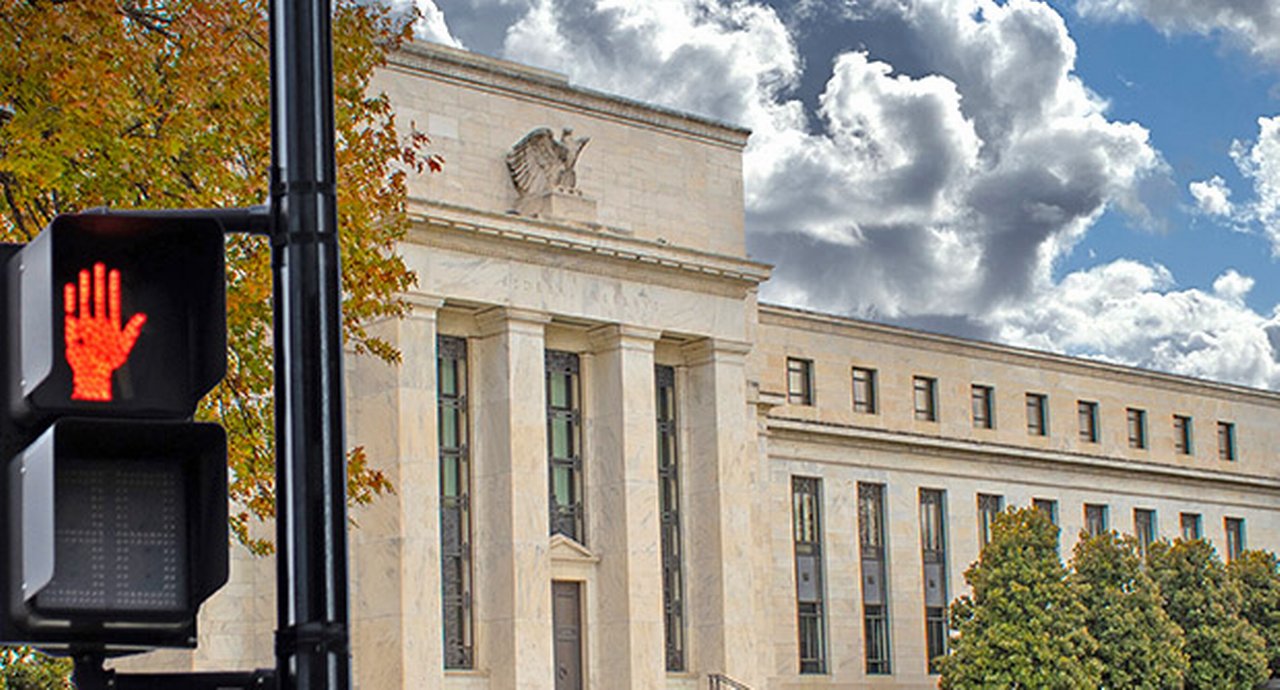 Federal Reserve Building with a stop sign