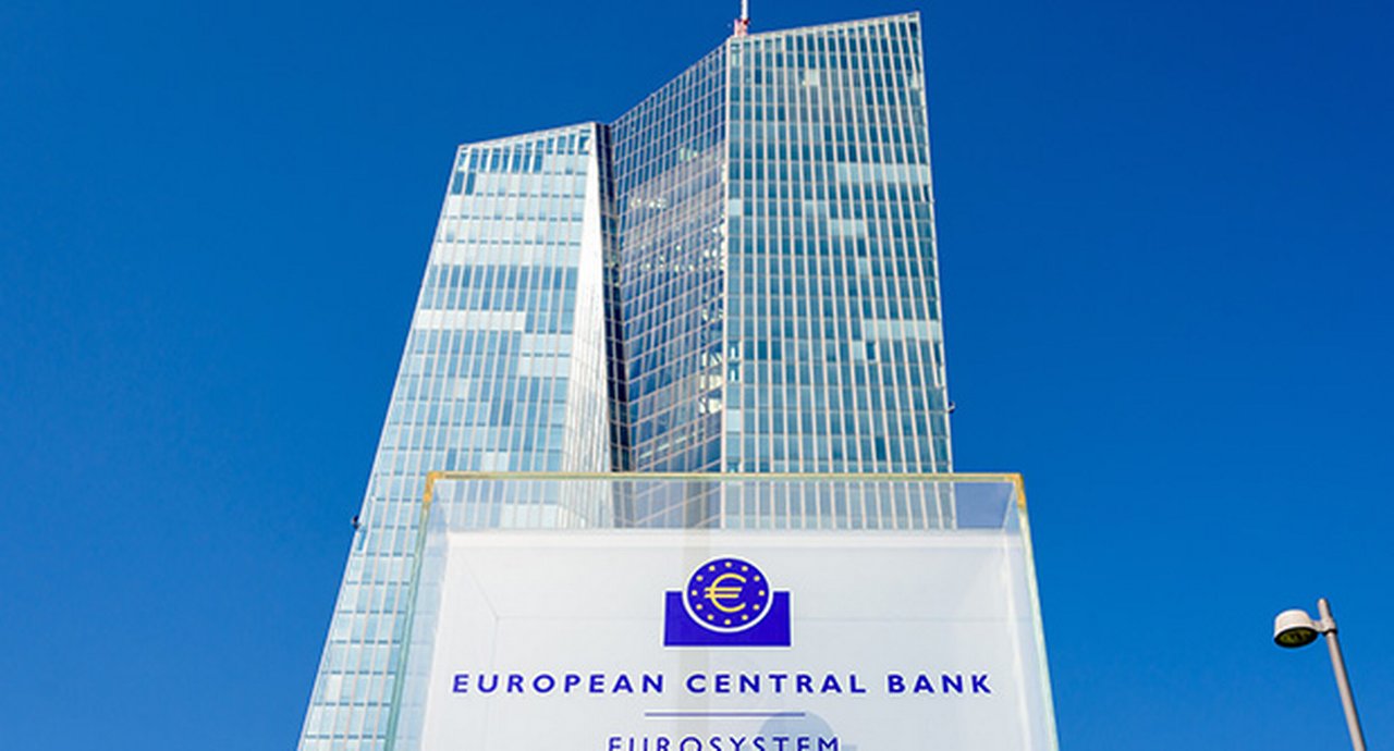 Low angle view of the sign and logo of the European Central Bank at the southern entrance of the Skytower building, headquarters of the ECB since 2015.