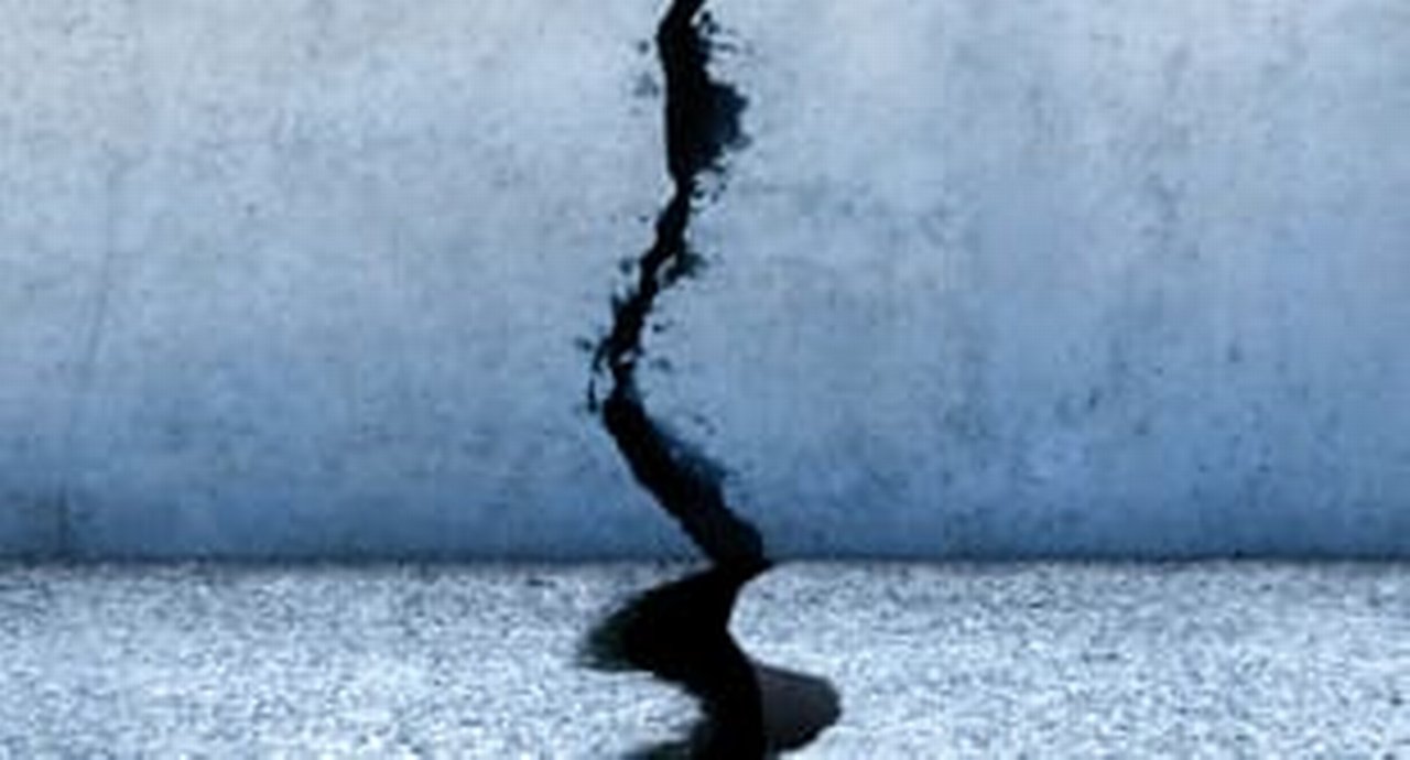 Crack Running Through Concrete Walls And Floor