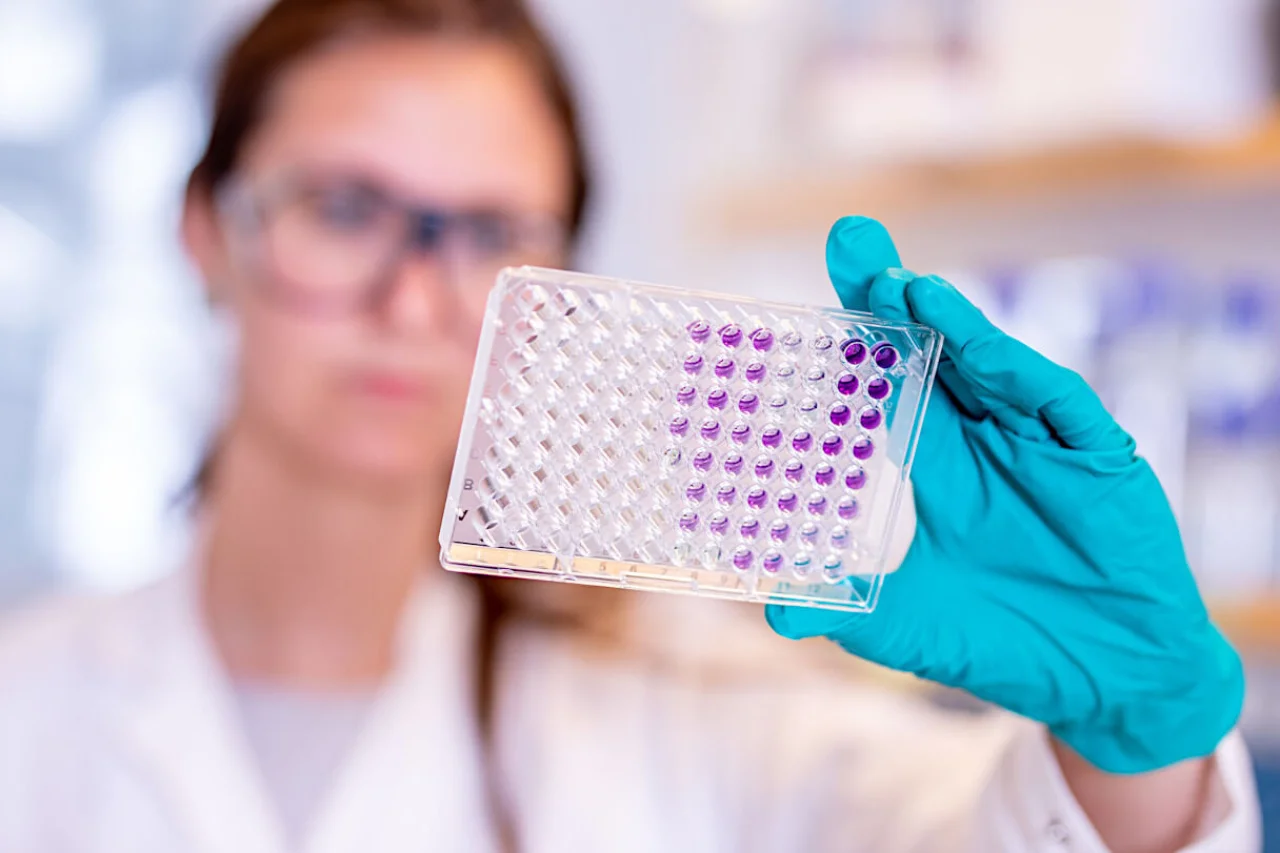 Astra zeneca scientist in Covid-19 production_lab