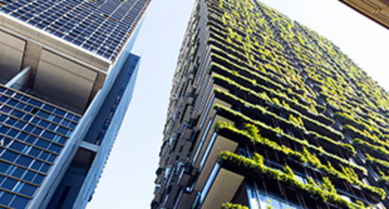 Low angle view of apartment building with vertical garden