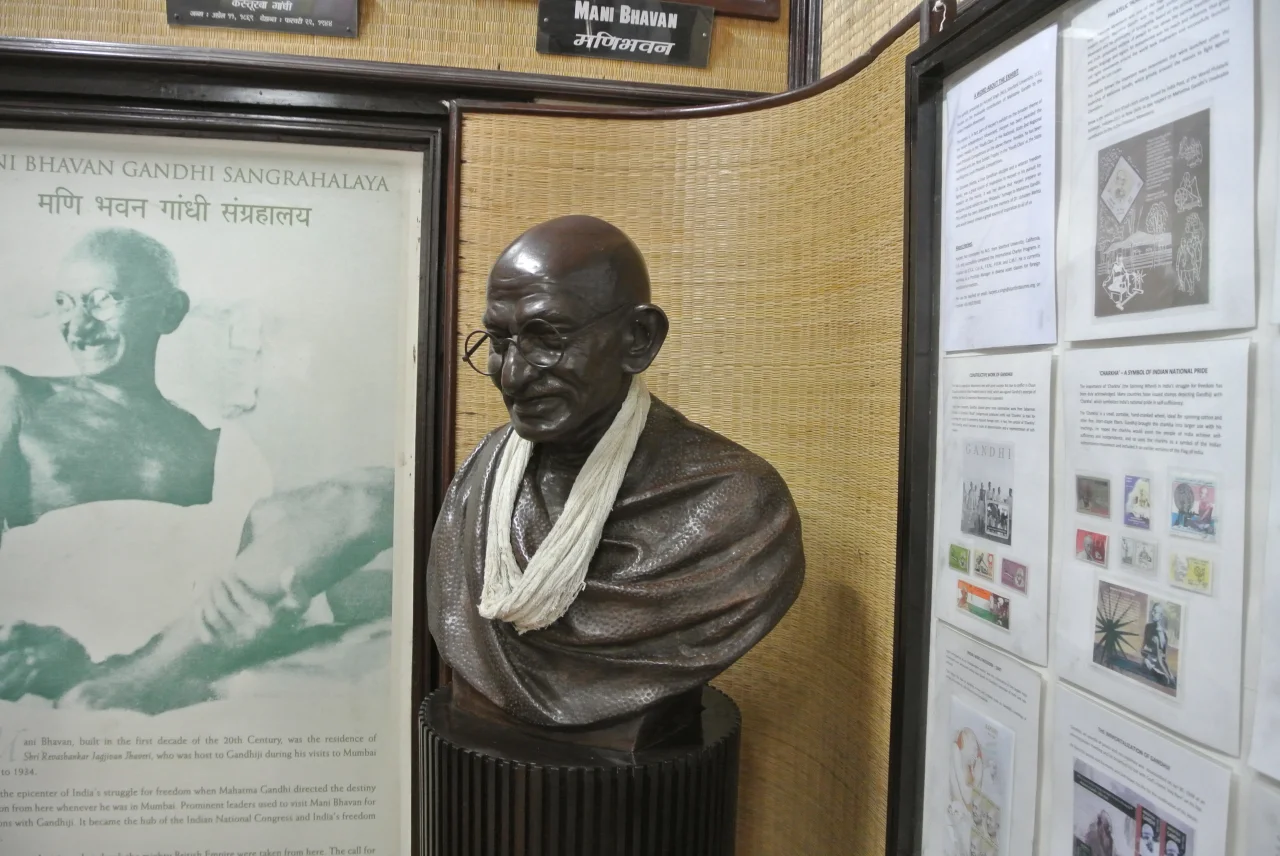A bronze of Mahatma Ghandi greets visitors to his former Mumbai home, Mani Bhavan Ghandi Sangahalaya