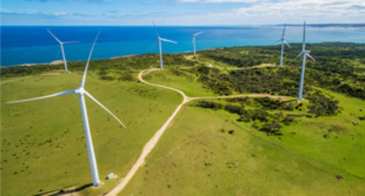 Aerial view of wind farm in rural area on bright sunny day in Australia