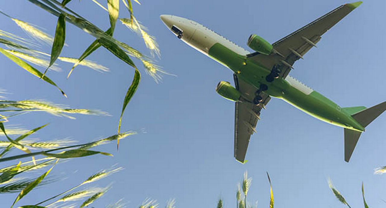 Airplane flying in the blue sky