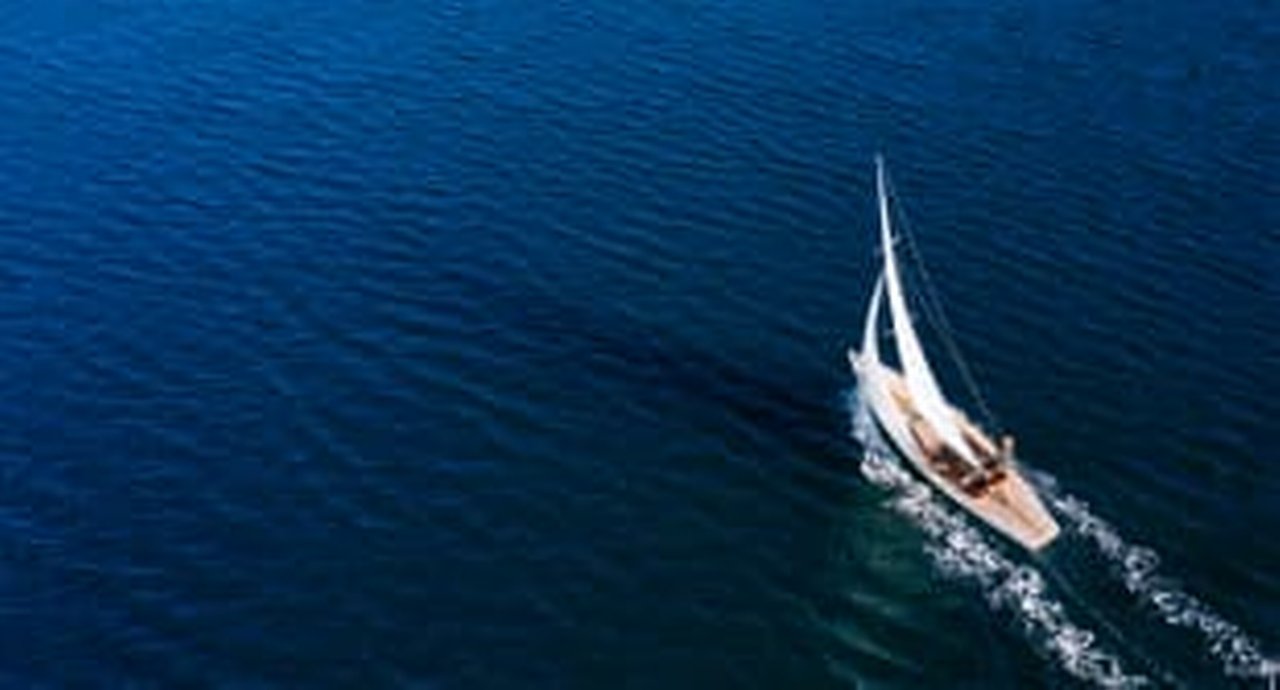 Classic sail boat in Mediterranean sea, aerial view