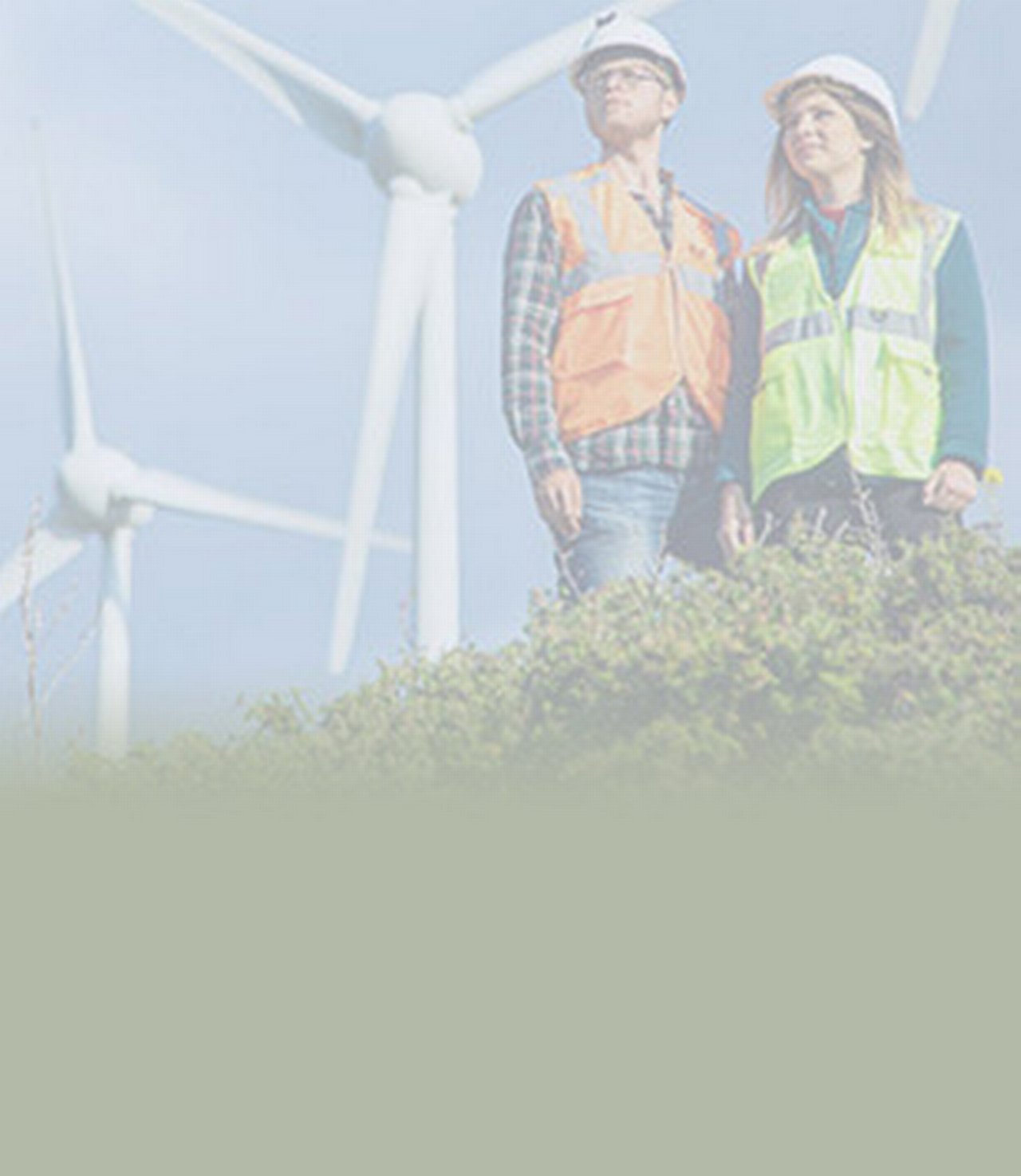 A team of engineers near a wind turbine