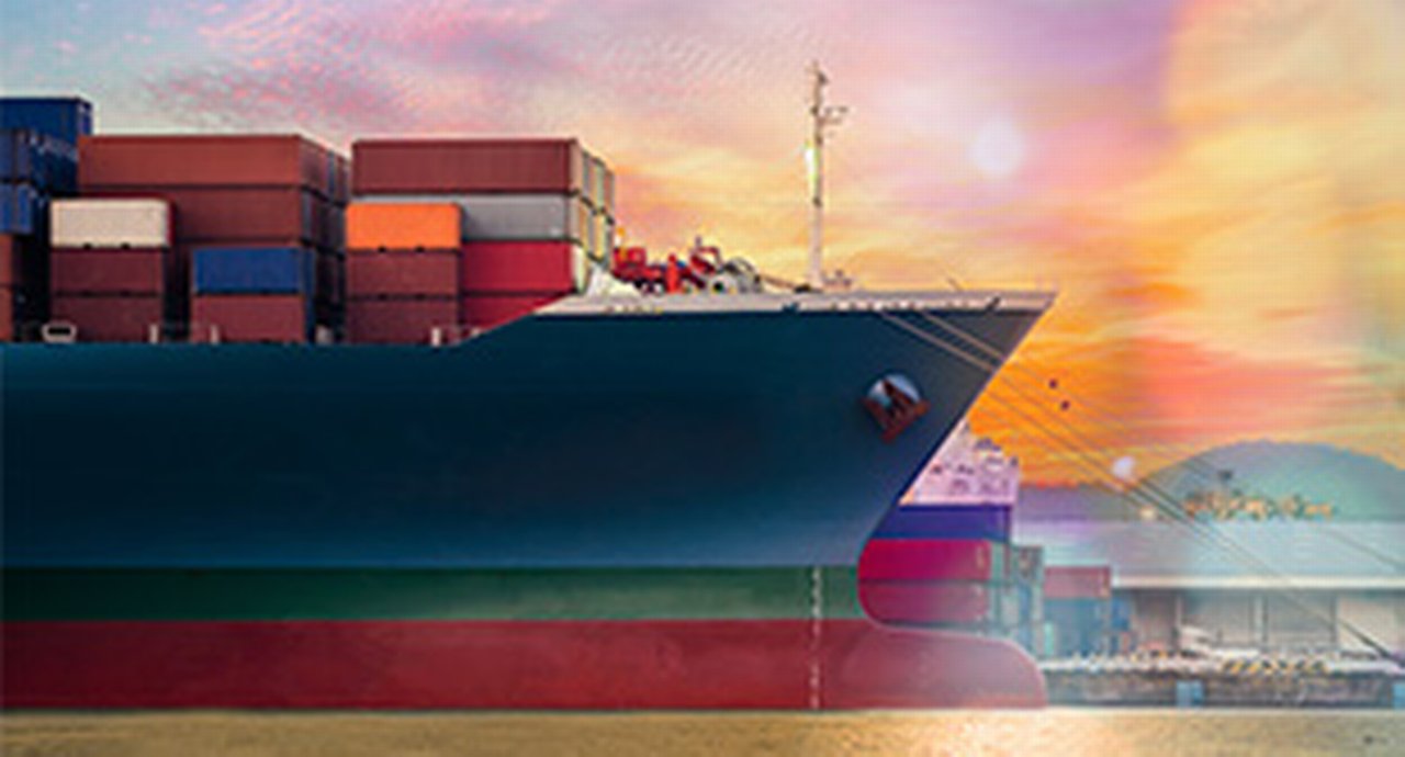 big container ship in harbour in front of colorful background