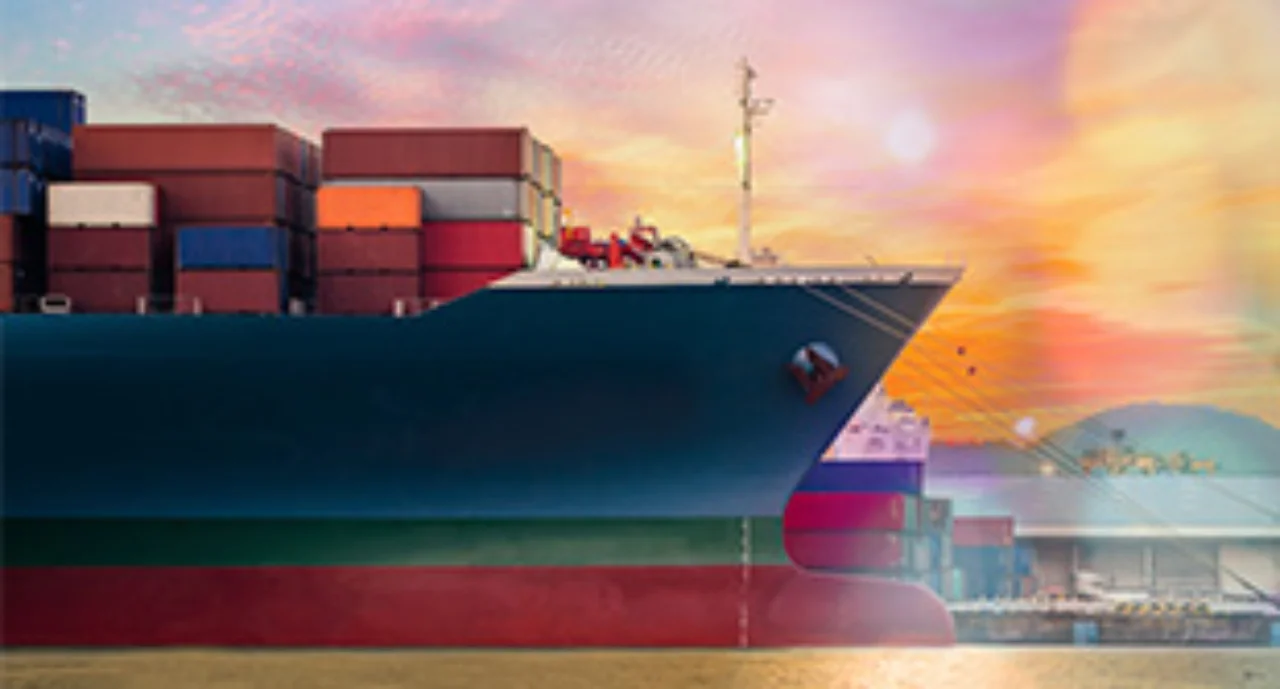 big container ship in harbour in front of colorful background