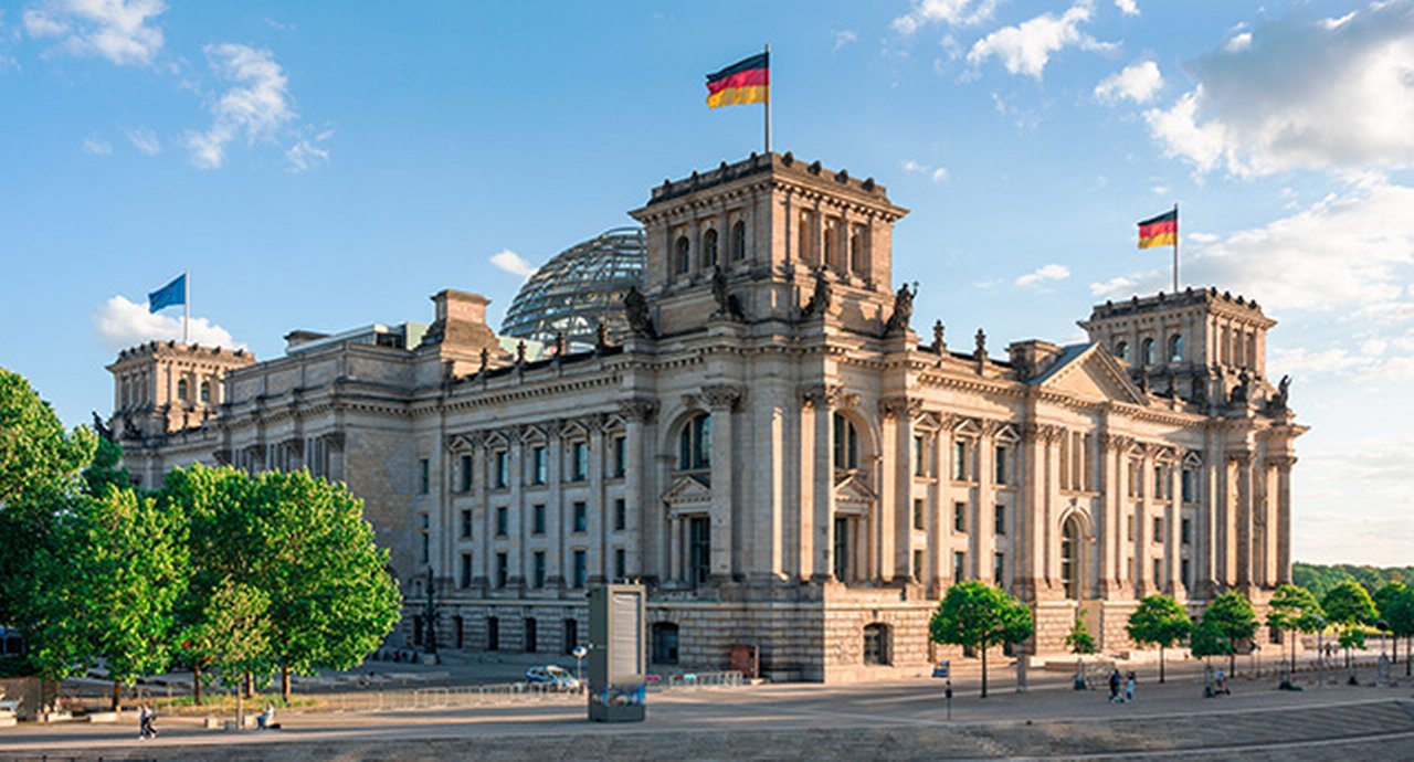 Reichstag with German flag, Berlin, Germany