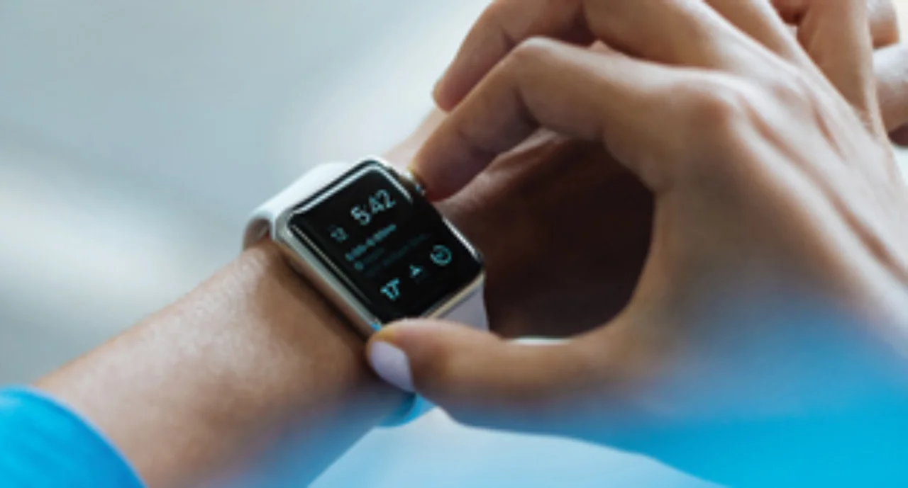 A close-up of a smart watch that is operated