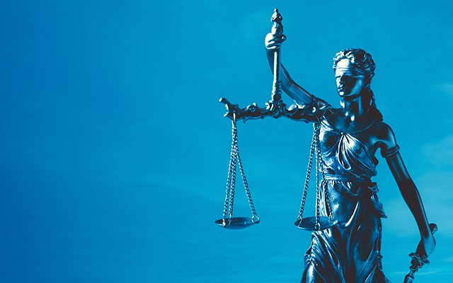 Statue of Lady Justice holding scales