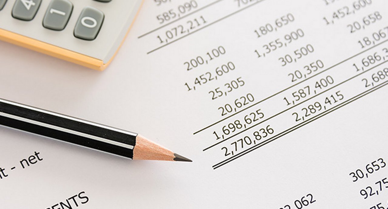 Pencil on an accounting ledger