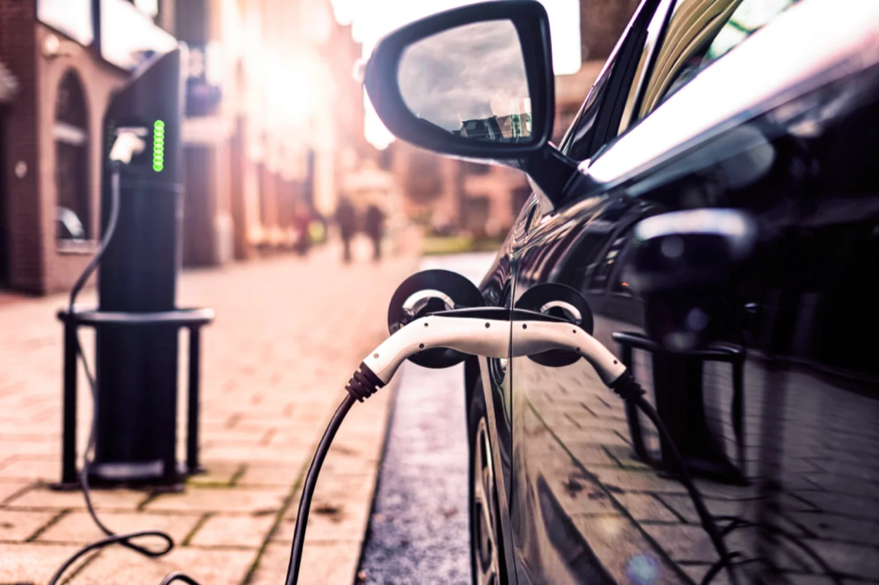 Electric Vehicle in Park Charging station in UK Street
