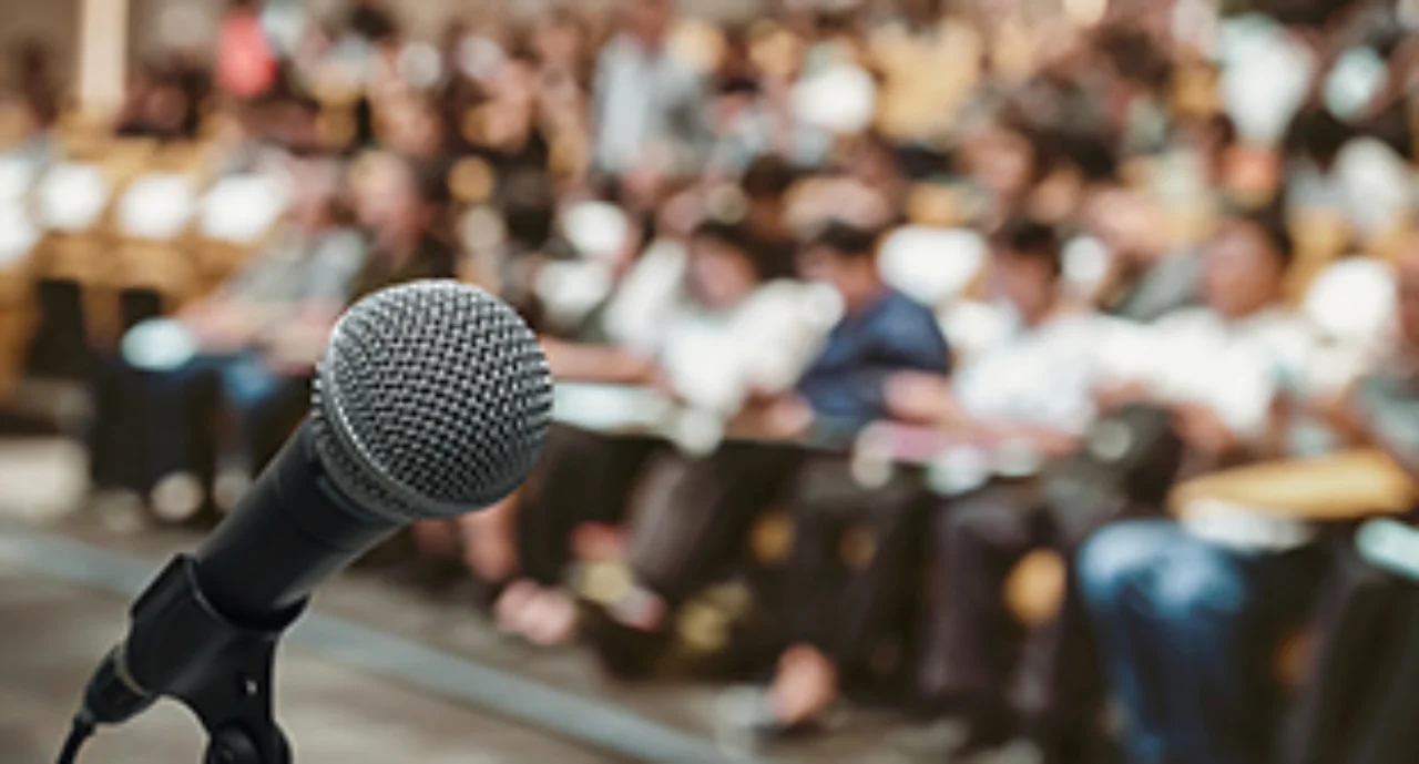 microphone in front of listening people