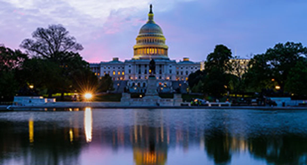 The White House across a pond in dusk