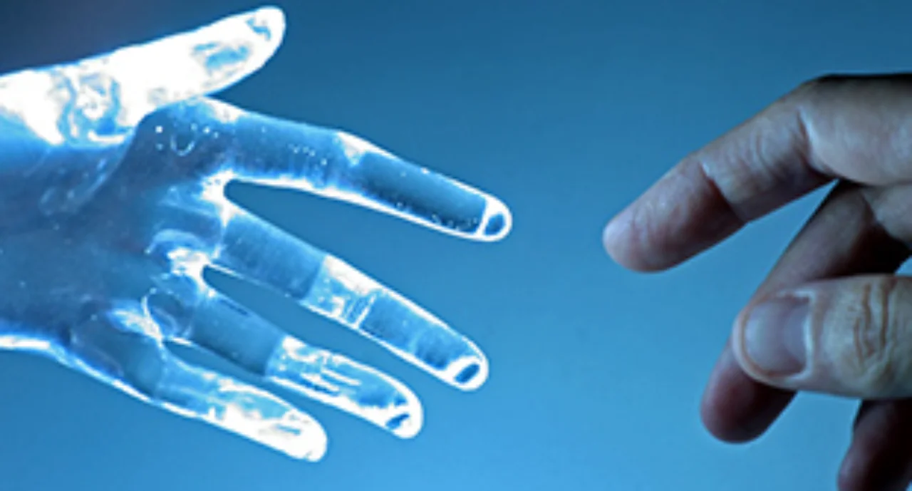 Human hand touches an atrial glass hand