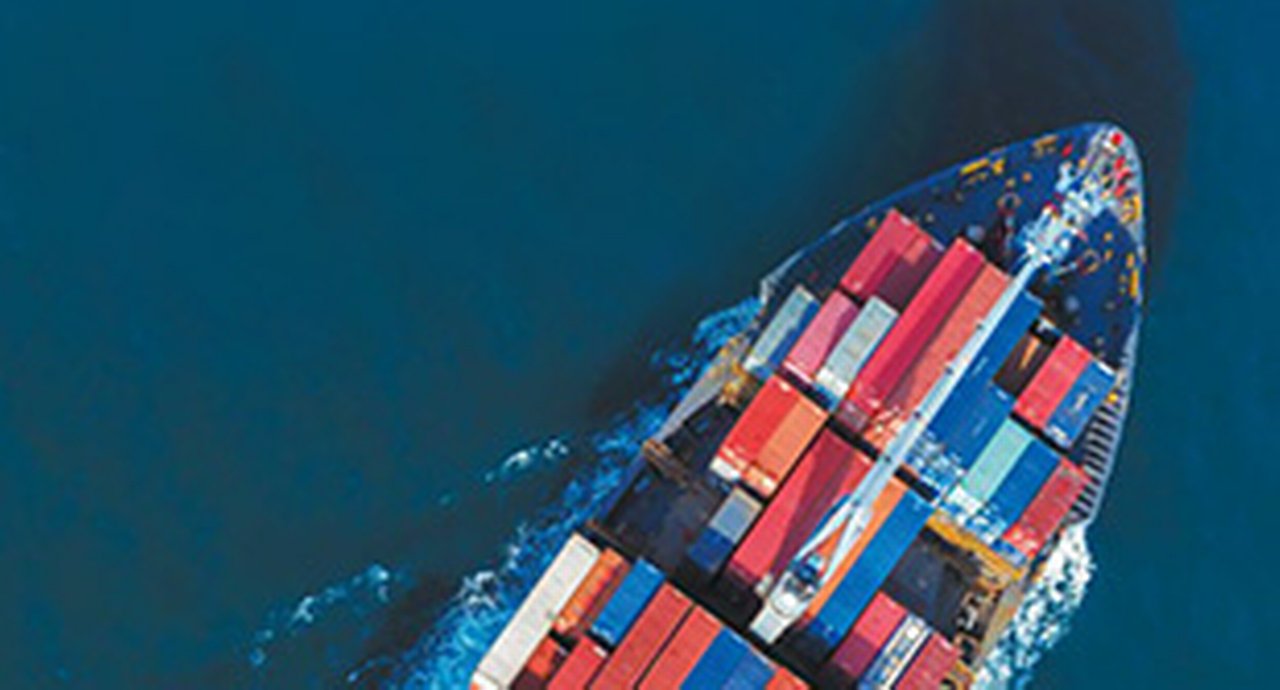 Front of a cargo ship with containers