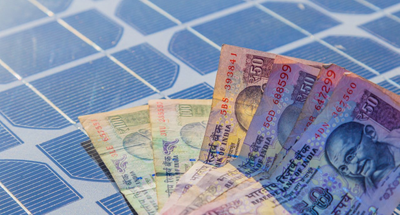 Indian Currency Note On Solar Panel In Day Light