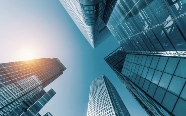 skyscrapers in a finance district from a low angle
