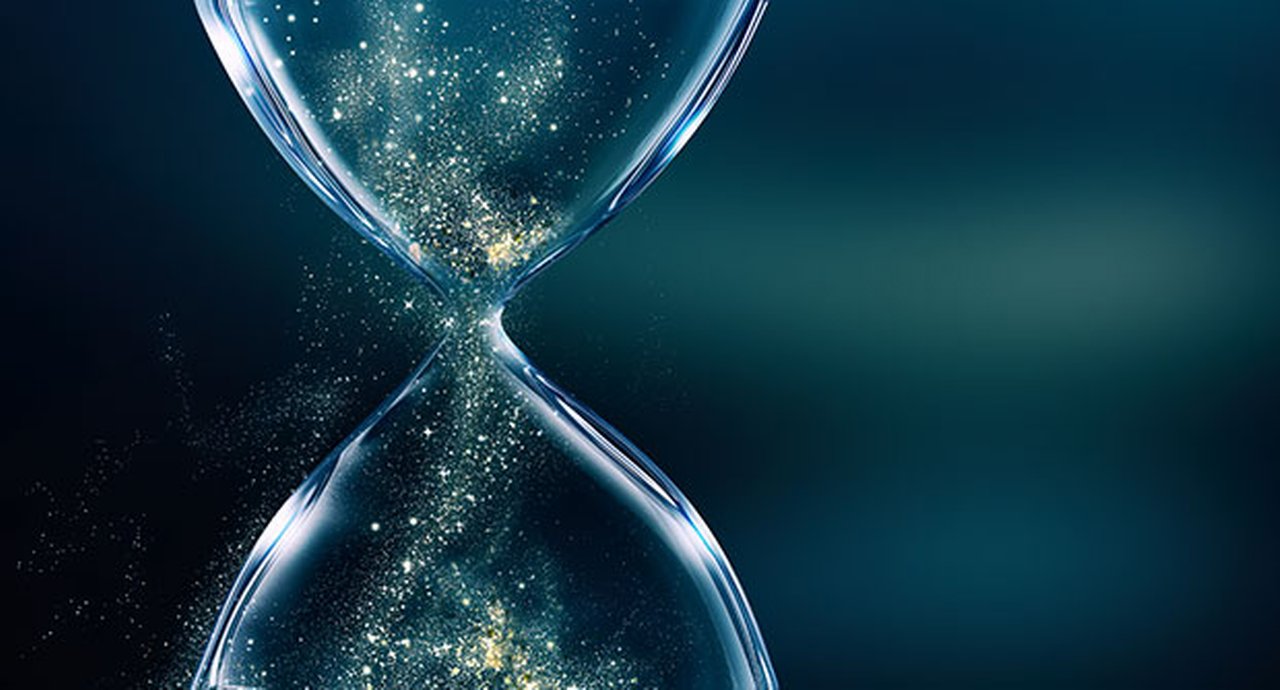 Glass Hourglass With Glowing Sand