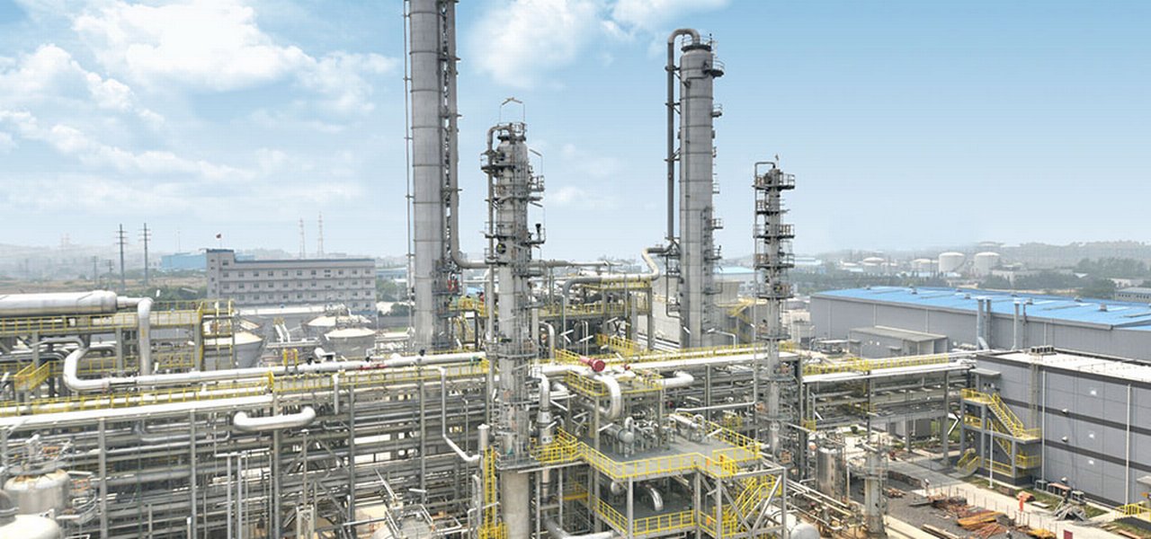 Chemical refinery under a blue sky