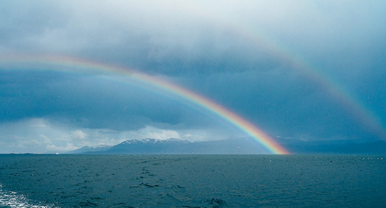 Double Rainbow In Beagle Channel On A Cloudy Day