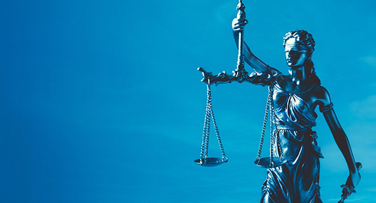 Statue of Lady Justice holding scales