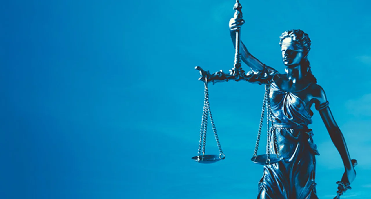 Statue of Lady Justice holding scales