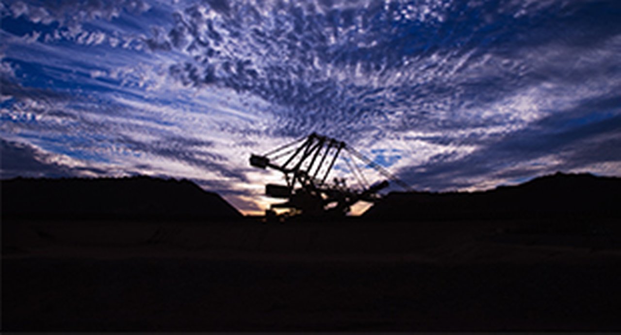 Iron ore mine site in the sunset