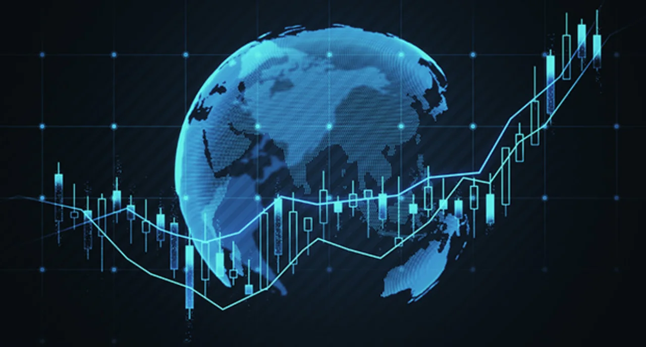 close up of globe and candlestick forex chart