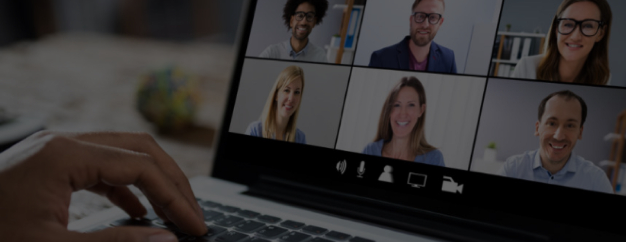 A virtual conference shown on a laptop screen