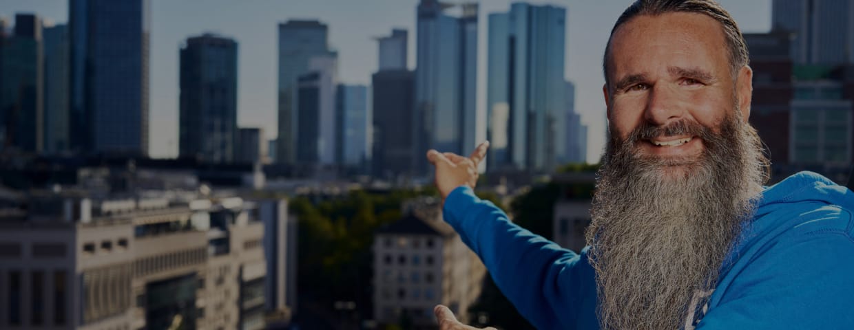 Jürgen Schmitt with a city in the background