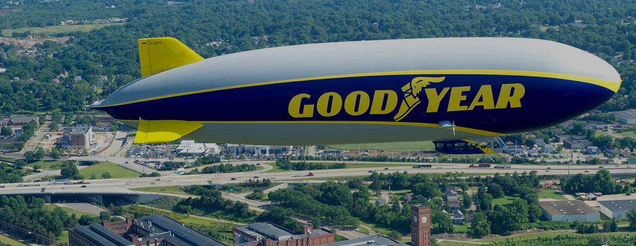 A Goodyear Zeppelin over a city