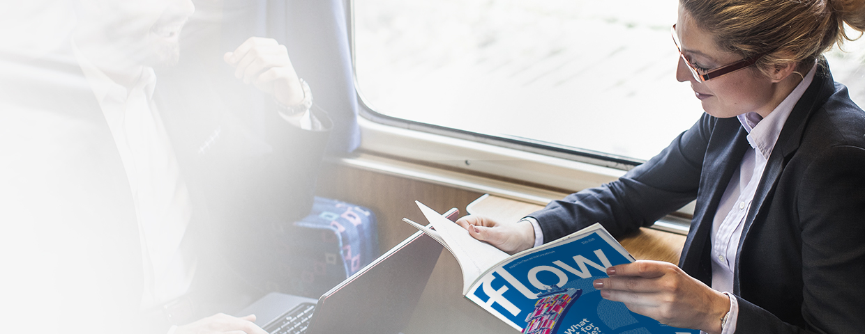 Young woman reading new flow magazine