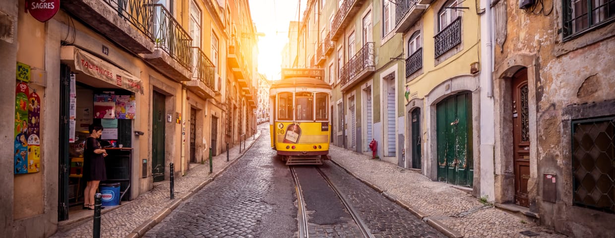 View of the historic city of Lisbon in Portugal with the famous tram 28 and the funiculars that take locals and tourists up and down.