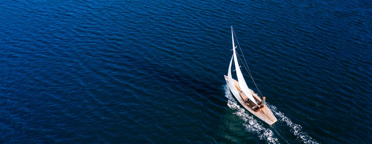 Classic sail boat in Mediterranean sea, aerial view