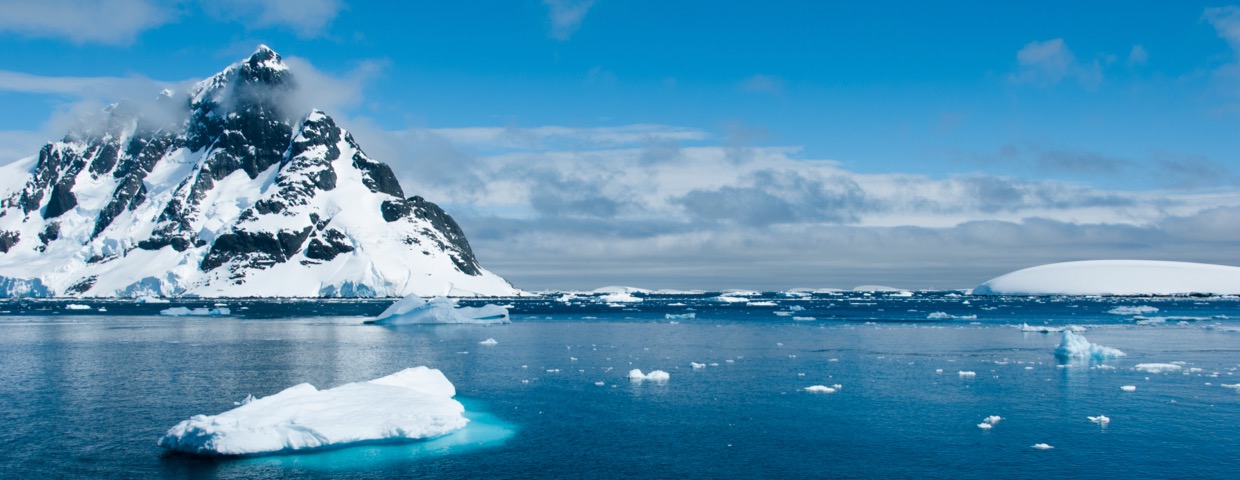 Mountains and ices scenic view in Antarctica during sunny day