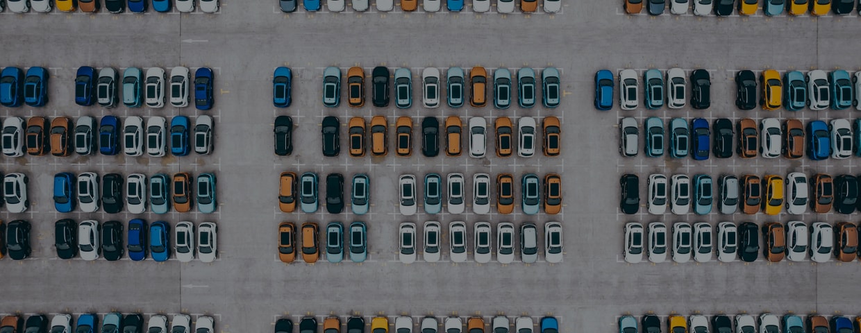 Aerial View Of Rows Of New Cars