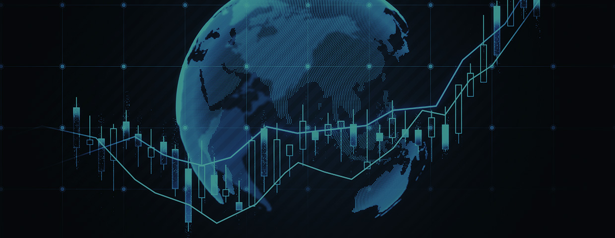 close up of globe and candlestick forex chart