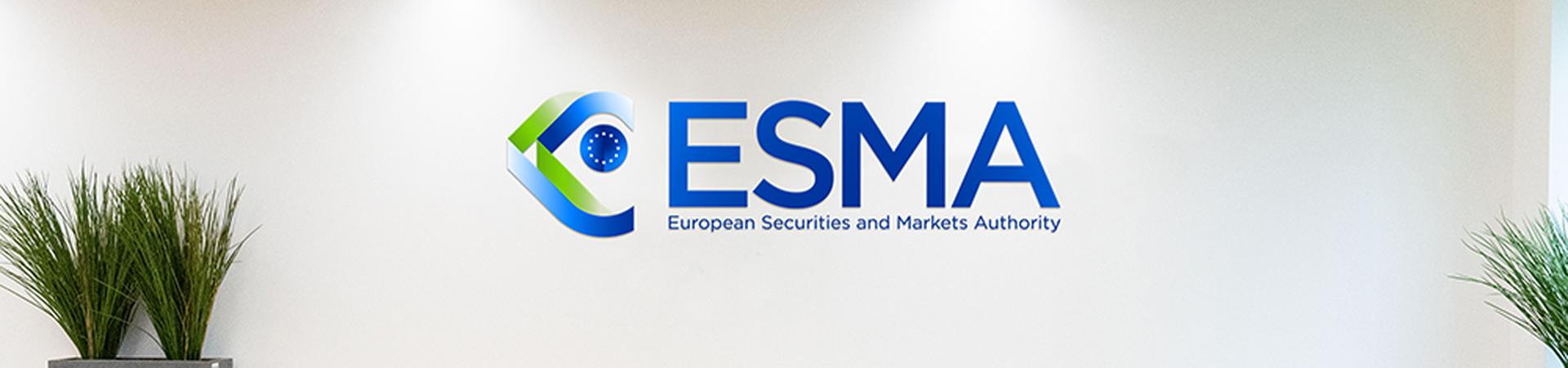 ESMA Logo set on a wall above green chairs