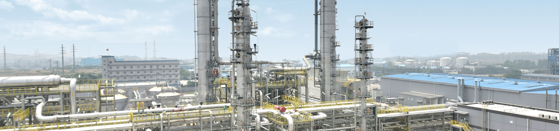 Chemical refinery under a blue sky