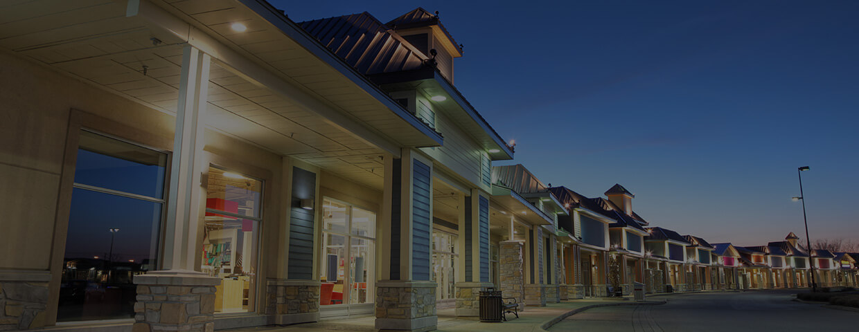 A deserted shopping mile at dusk