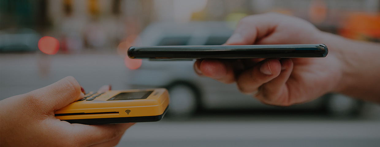 Close-up of two smartphones in a payment transaction